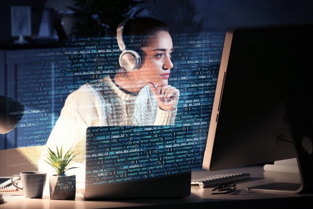Young,Woman,Working,With,Computer,At,Table.,Concept,Of,Cyber